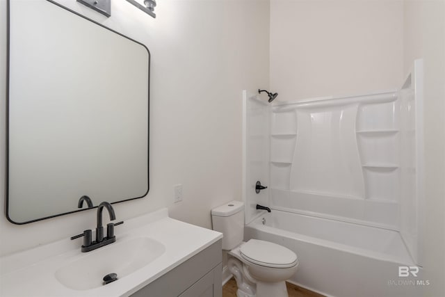 full bathroom featuring vanity, shower / tub combination, and toilet