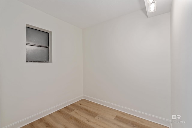 unfurnished room featuring hardwood / wood-style floors