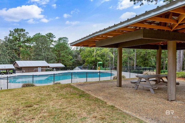 view of pool featuring a patio