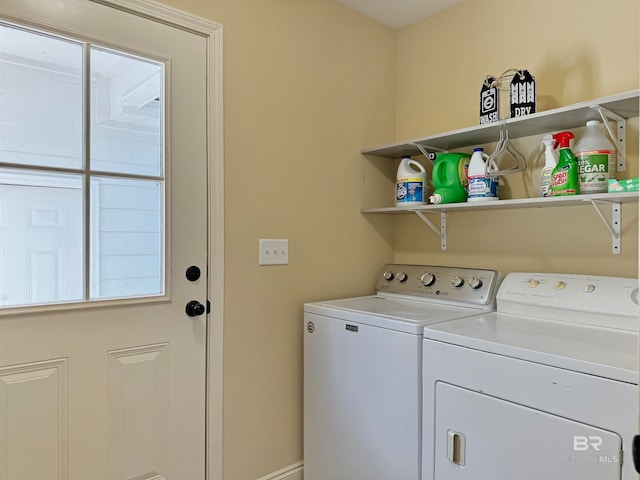 washroom with washer and dryer