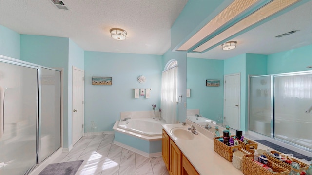 22355 County Road 12, Foley, AL 36535 - bathroom featuring a stall shower, a bath, marble look tile flooring, vanity, and baseboards