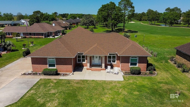 22355 County Road 12, Foley, AL 36535 - rear view of property with brick siding and a yard