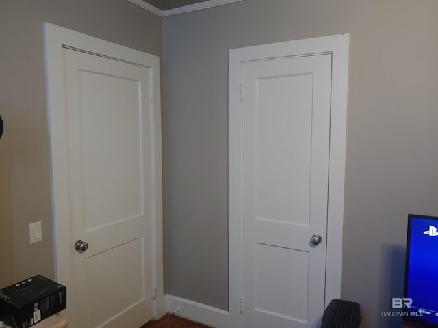 interior space featuring crown molding