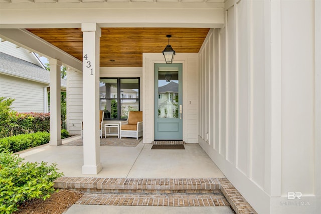 doorway to property with a porch