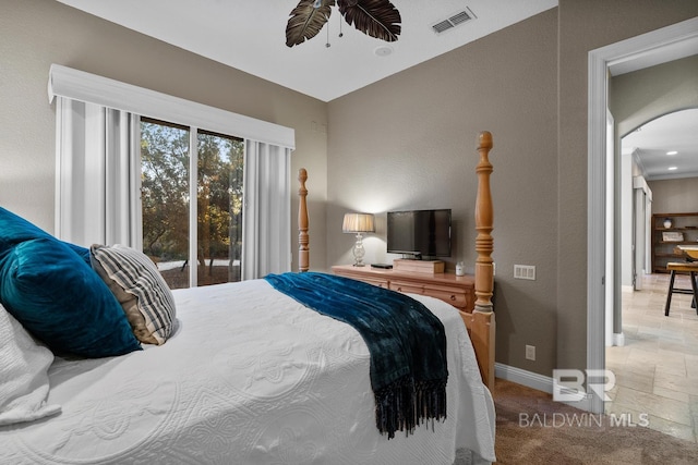 bedroom featuring access to exterior and ceiling fan