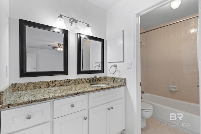 6701 Dickens Ferry Rd Unit 40, Mobile, AL 36608 - bathroom featuring toilet, vanity, tile patterned flooring, ceiling fan, and bathtub / shower combination