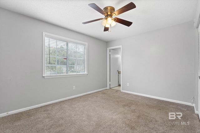 6701 Dickens Ferry Rd Unit 40, Mobile, AL 36608 - unfurnished bedroom with light colored carpet, baseboards, and ceiling fan