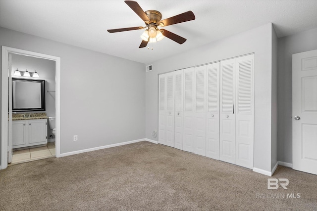 6701 Dickens Ferry Rd Unit 40, Mobile, AL 36608 - unfurnished bedroom with light colored carpet, a closet, a sink, and connected bathroom