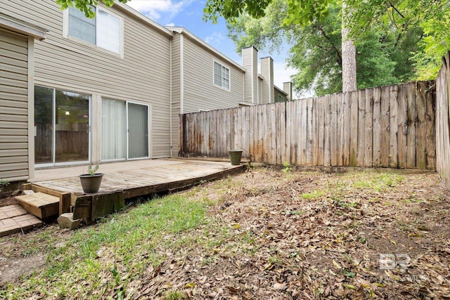 6701 Dickens Ferry Rd Unit 40, Mobile, AL 36608 - fenced backyard featuring a deck