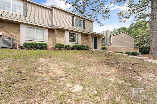 6701 Dickens Ferry Rd Unit 40, Mobile, AL 36608 - view of front facade with brick siding and cooling unit