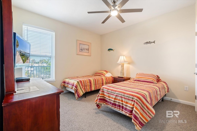 bedroom featuring ceiling fan and carpet floors