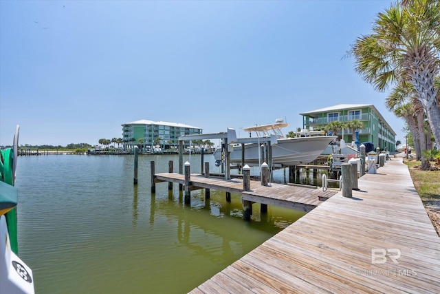 dock area featuring a water view