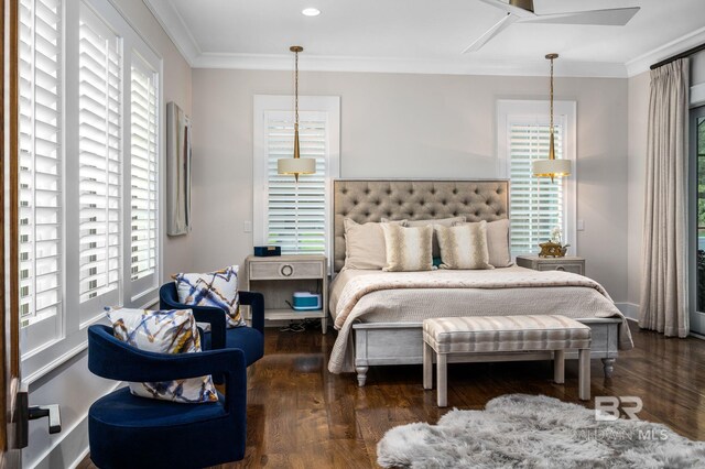 bedroom featuring ornamental molding, multiple windows, and wood finished floors