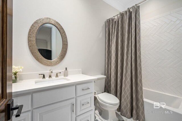 full bathroom featuring vanity, toilet, and shower / tub combo with curtain