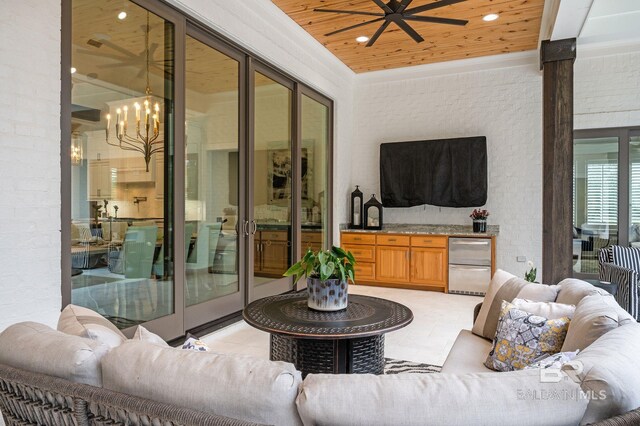 view of patio / terrace featuring a ceiling fan and an outdoor hangout area