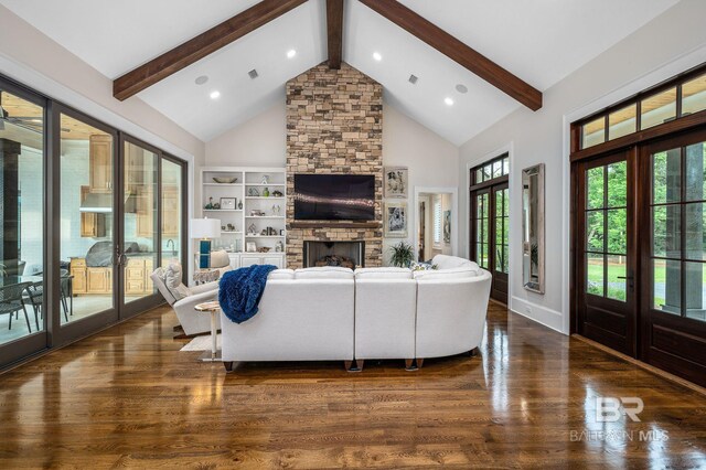 living room featuring a fireplace, beam ceiling, wood finished floors, high vaulted ceiling, and recessed lighting