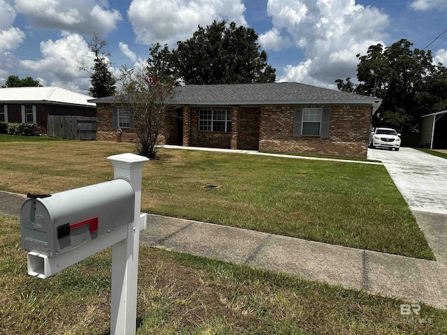 single story home featuring a front yard