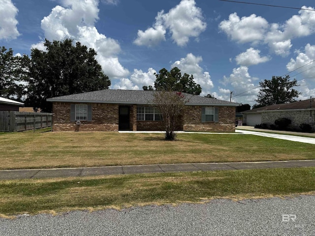 single story home with a front yard