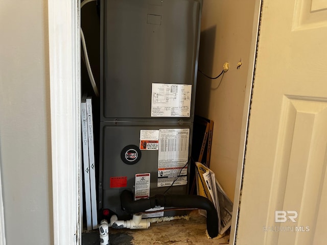 utility room with heating unit