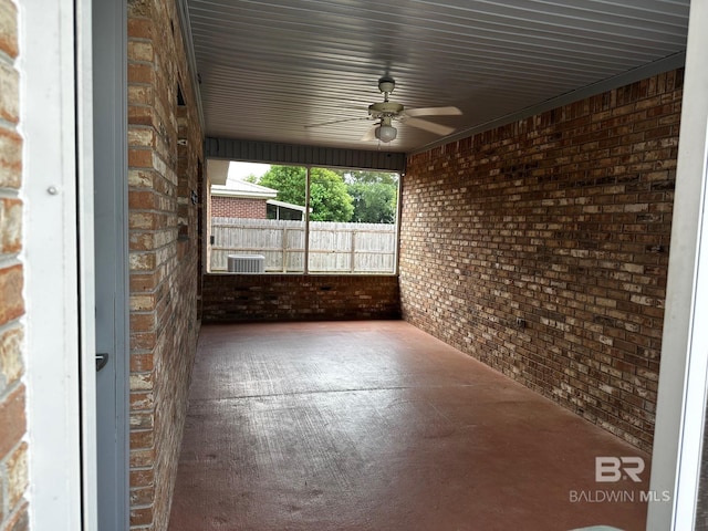 view of patio featuring ceiling fan