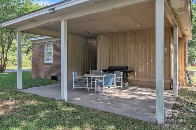 view of patio / terrace featuring a carport