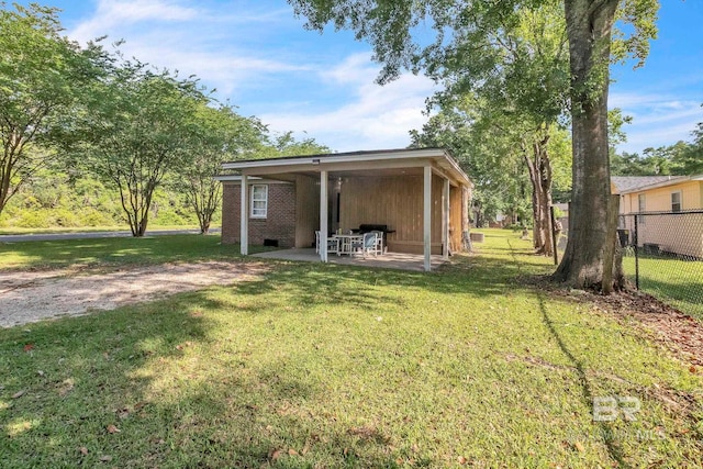 view of outbuilding with fence