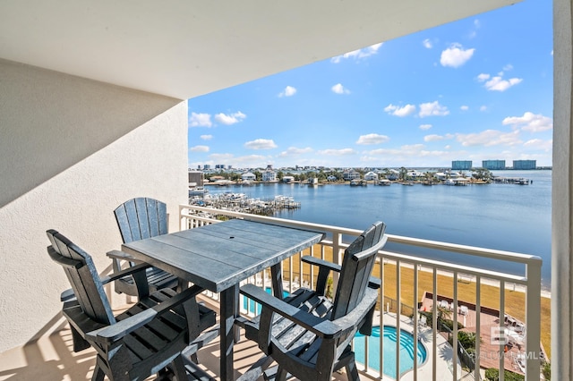 balcony featuring a water view