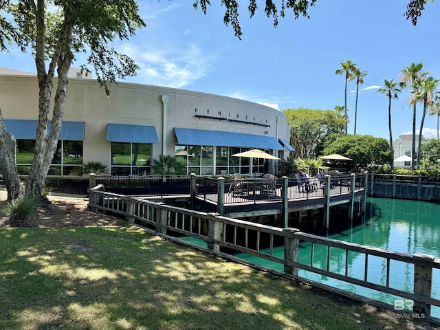 200 Peninsula Blvd Unit A202, Gulf Shores, AL 36542 - dock area with a yard