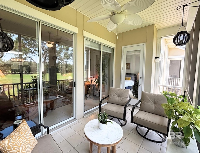 200 Peninsula Blvd Unit A202, Gulf Shores, AL 36542 - sunroom featuring ceiling fan and healthy amount of natural light