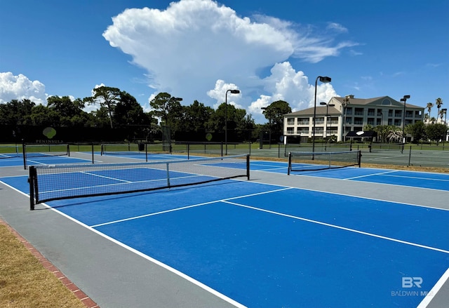 200 Peninsula Blvd Unit A202, Gulf Shores, AL 36542 - view of tennis court featuring community basketball court