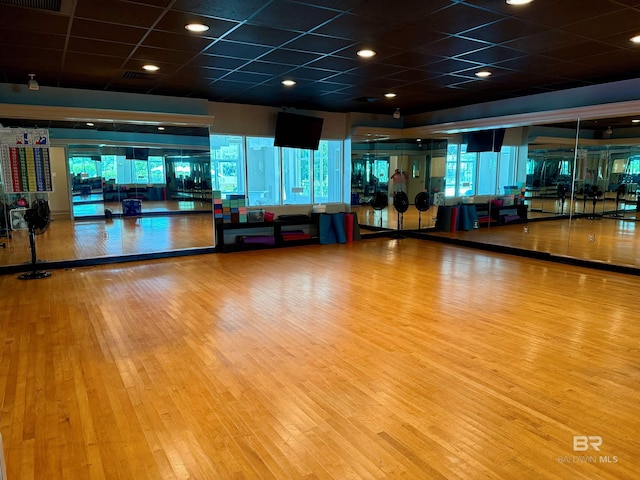 200 Peninsula Blvd Unit A202, Gulf Shores, AL 36542 - exercise room with a drop ceiling and wood finished floors