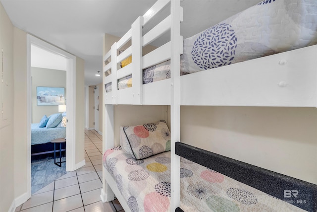 517 E Beach Blvd Unit 5D, Gulf Shores, AL 36542 - tiled bedroom with baseboards