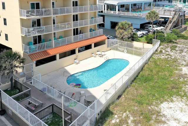 517 E Beach Blvd Unit 5D, Gulf Shores, AL 36542 - community pool featuring a patio