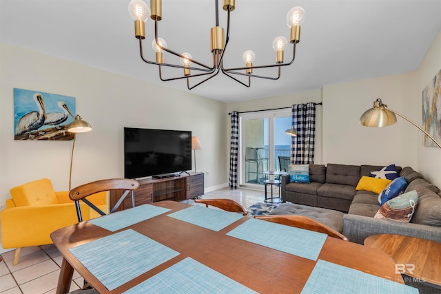 517 E Beach Blvd Unit 5D, Gulf Shores, AL 36542 - living room featuring a chandelier and light tile patterned floors