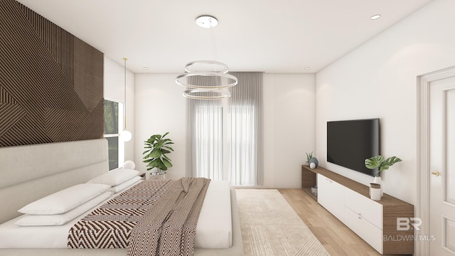 bedroom featuring a chandelier and light wood-type flooring