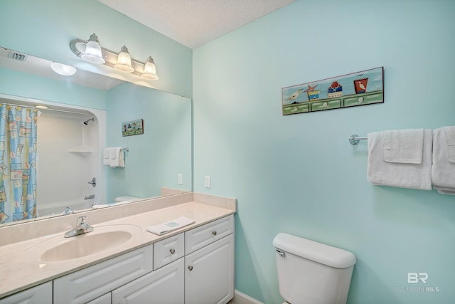 full bathroom featuring a textured ceiling, large vanity, shower / bathtub combination with curtain, and toilet