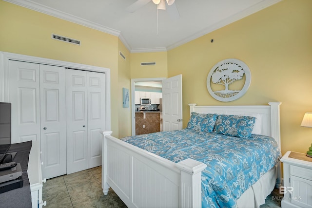 bedroom featuring ornamental molding, a closet, tile floors, and ceiling fan