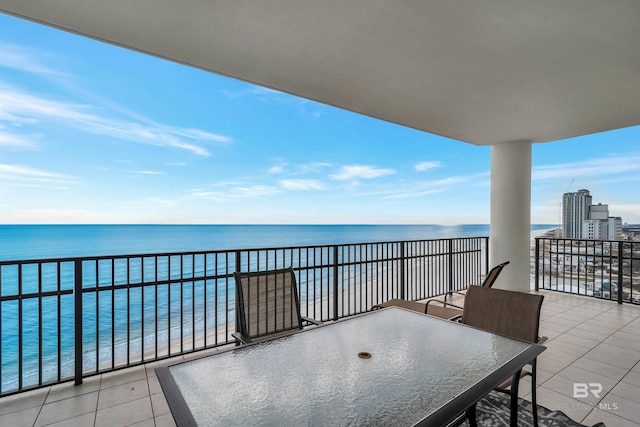 balcony featuring a water view