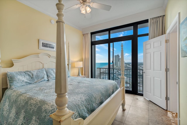 bedroom with access to outside, a water view, ornamental molding, light tile floors, and ceiling fan