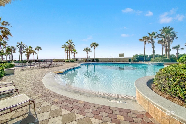 view of pool featuring a patio area