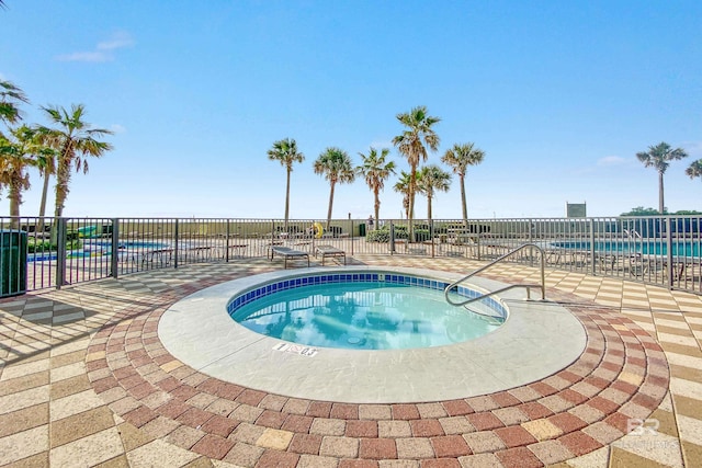 view of pool featuring a patio area