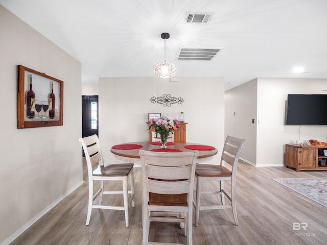 dining room featuring light hardwood / wood-style floors