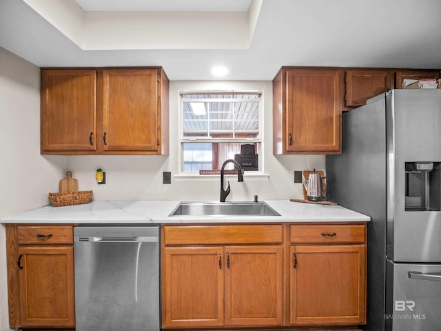 kitchen featuring stainless steel appliances and sink