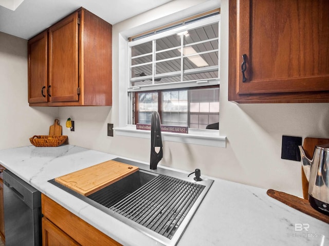 kitchen with dishwasher and sink