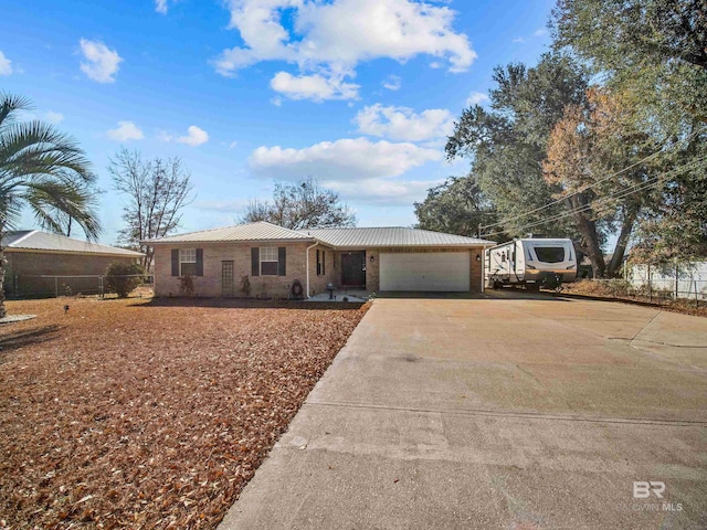 single story home with a garage