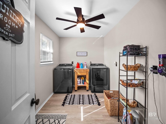 washroom featuring hardwood / wood-style flooring, washing machine and dryer, and ceiling fan