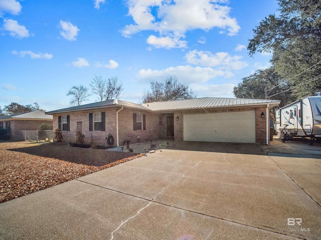 single story home with a garage