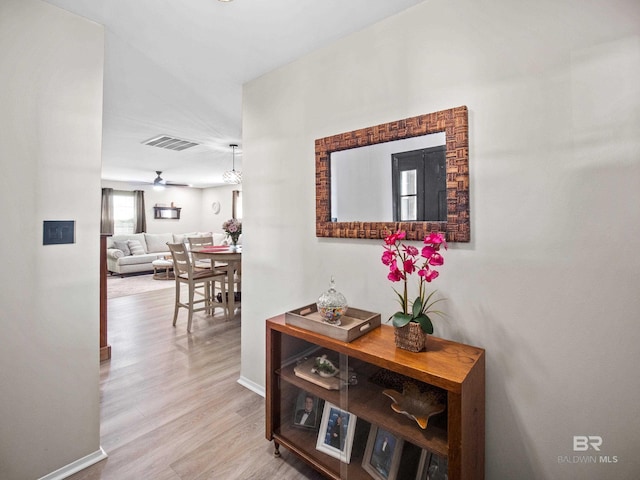 hall featuring light wood-type flooring