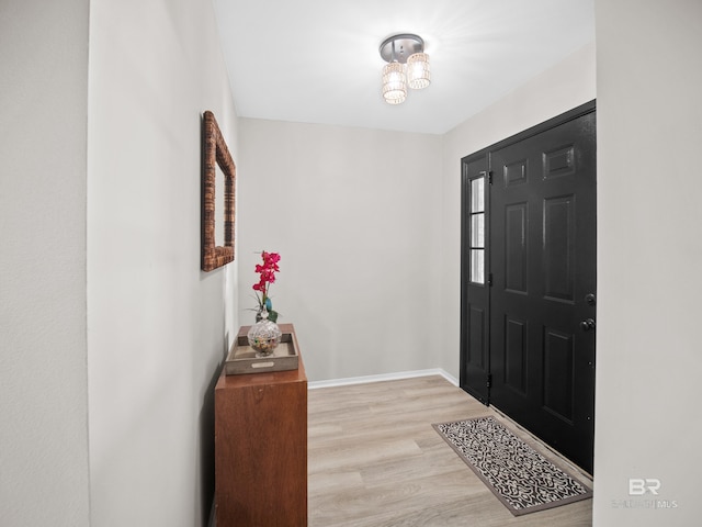 entryway with light hardwood / wood-style floors