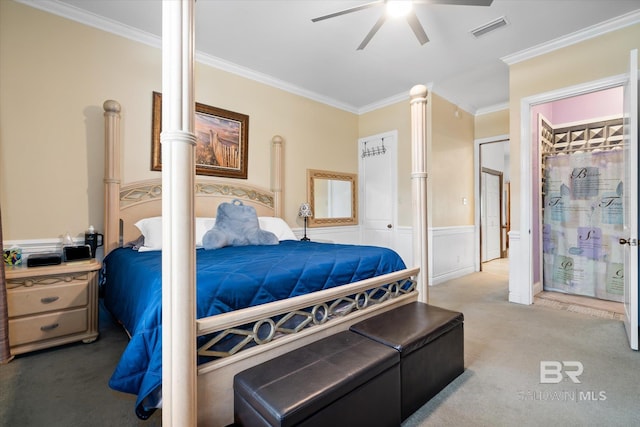 bedroom with ornamental molding, a closet, ceiling fan, and carpet